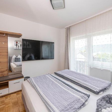 Gaestehaus Genf Velden am Woerthersee Phòng bức ảnh